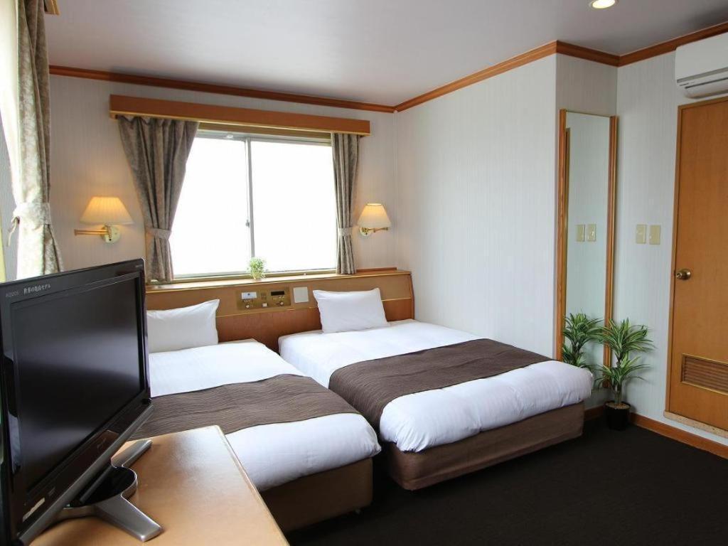 Hotel Livemax Budget Naha Tomarikou Екстериор снимка